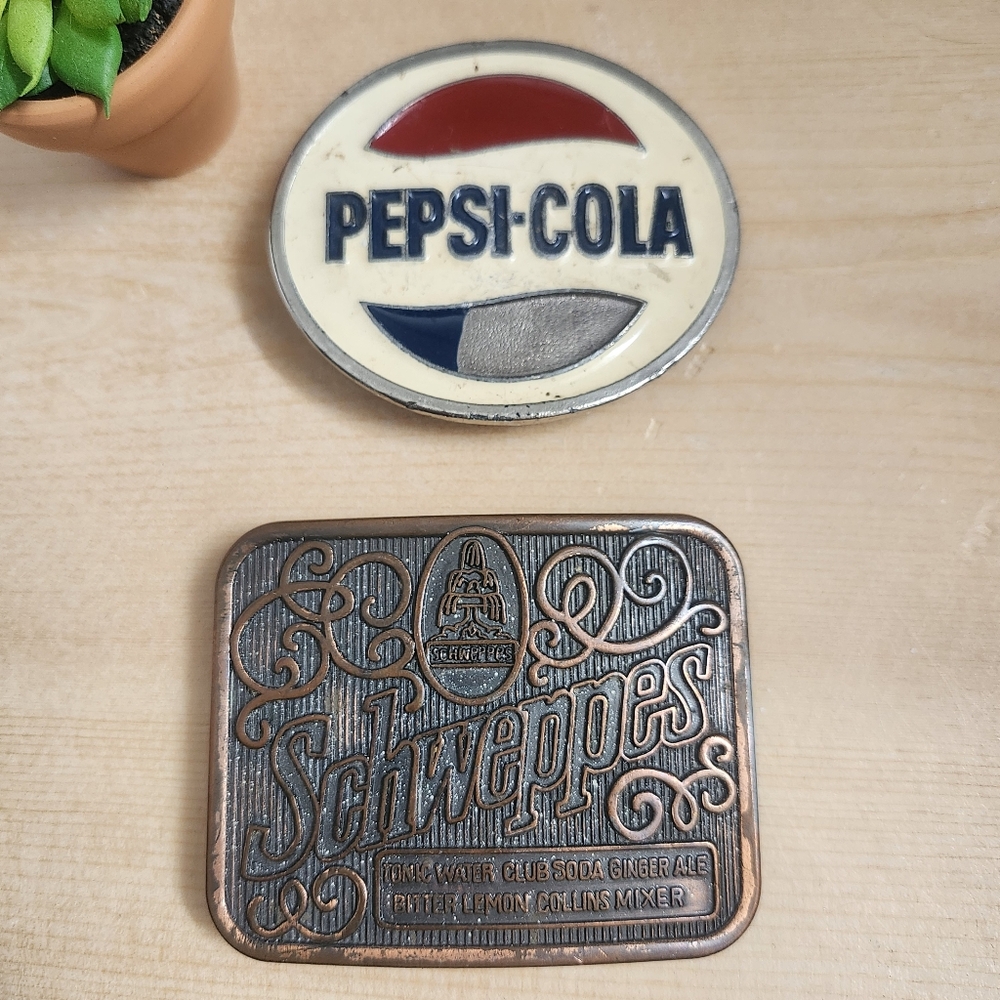 Pepsi-Cola and Schweppes vintage belt buckles